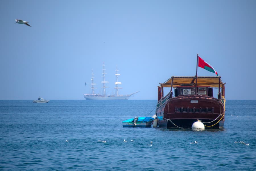 A traditional wooden dhow moored off Mutrah, Muscat